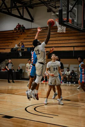 basketball player performing jump shot