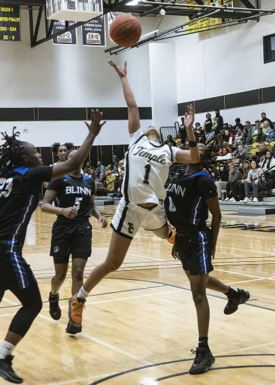 basketball player jumping for the ball