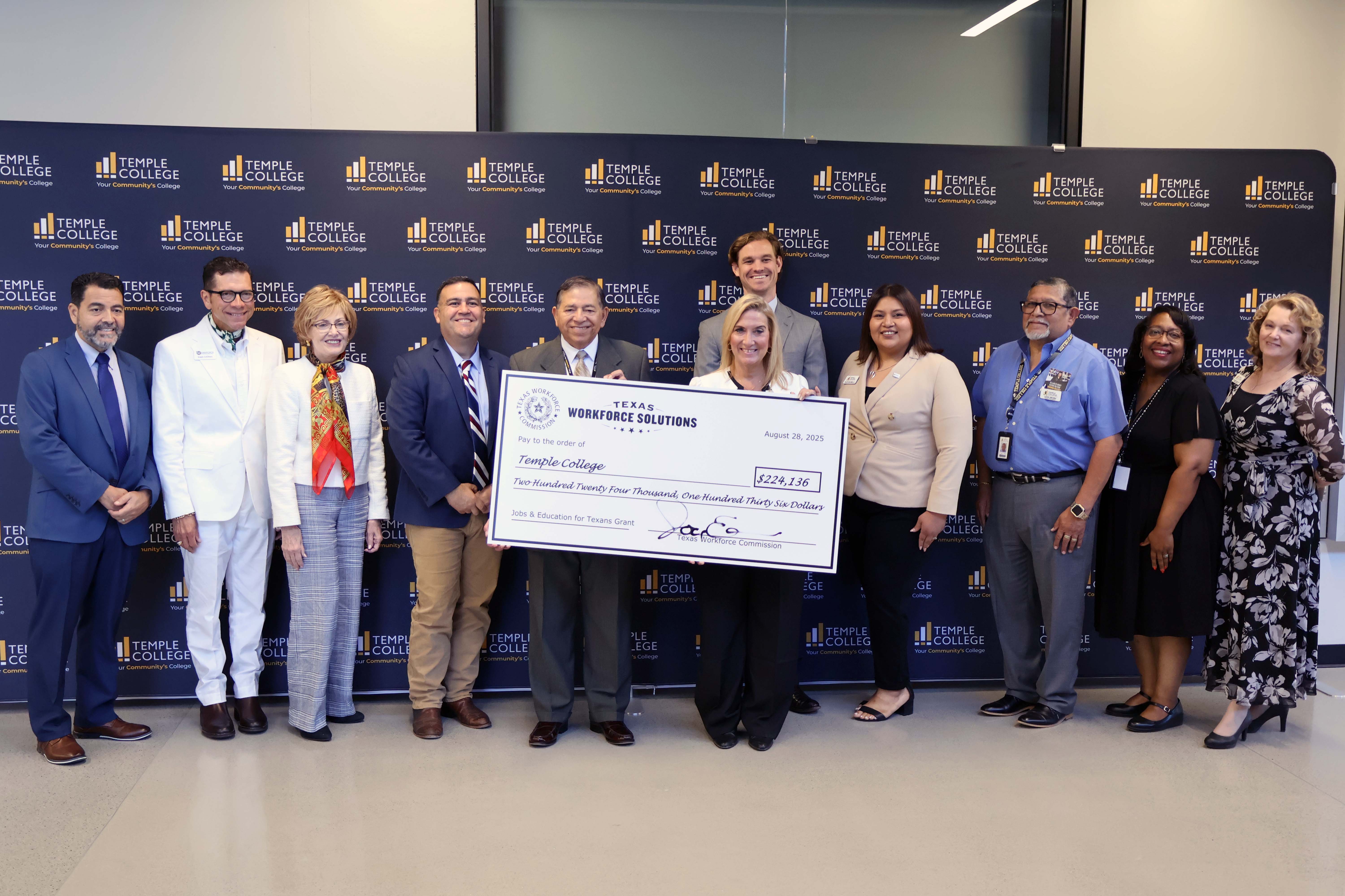 TC staff receive check for JET grant