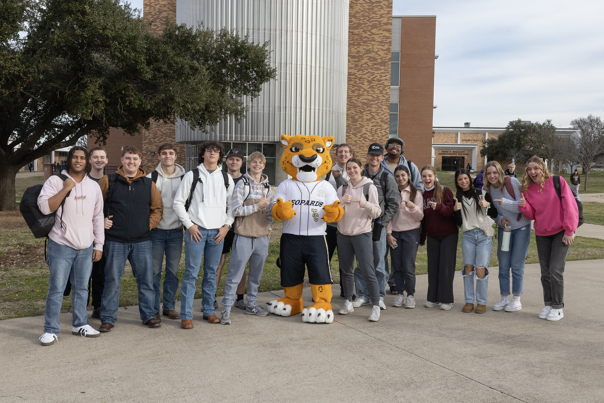 students with the leopard mascot