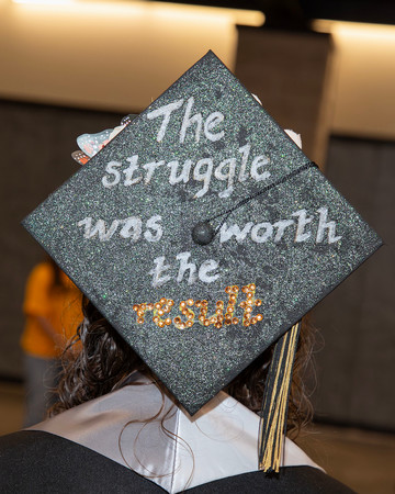 Graduation cap with the text "The struggle was worth the result"